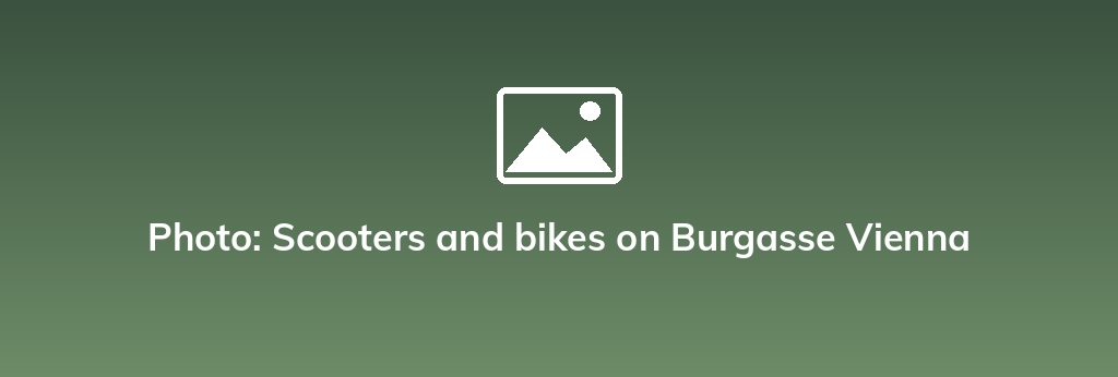 Photo: Scooters and bikes on Burgasse Vienna